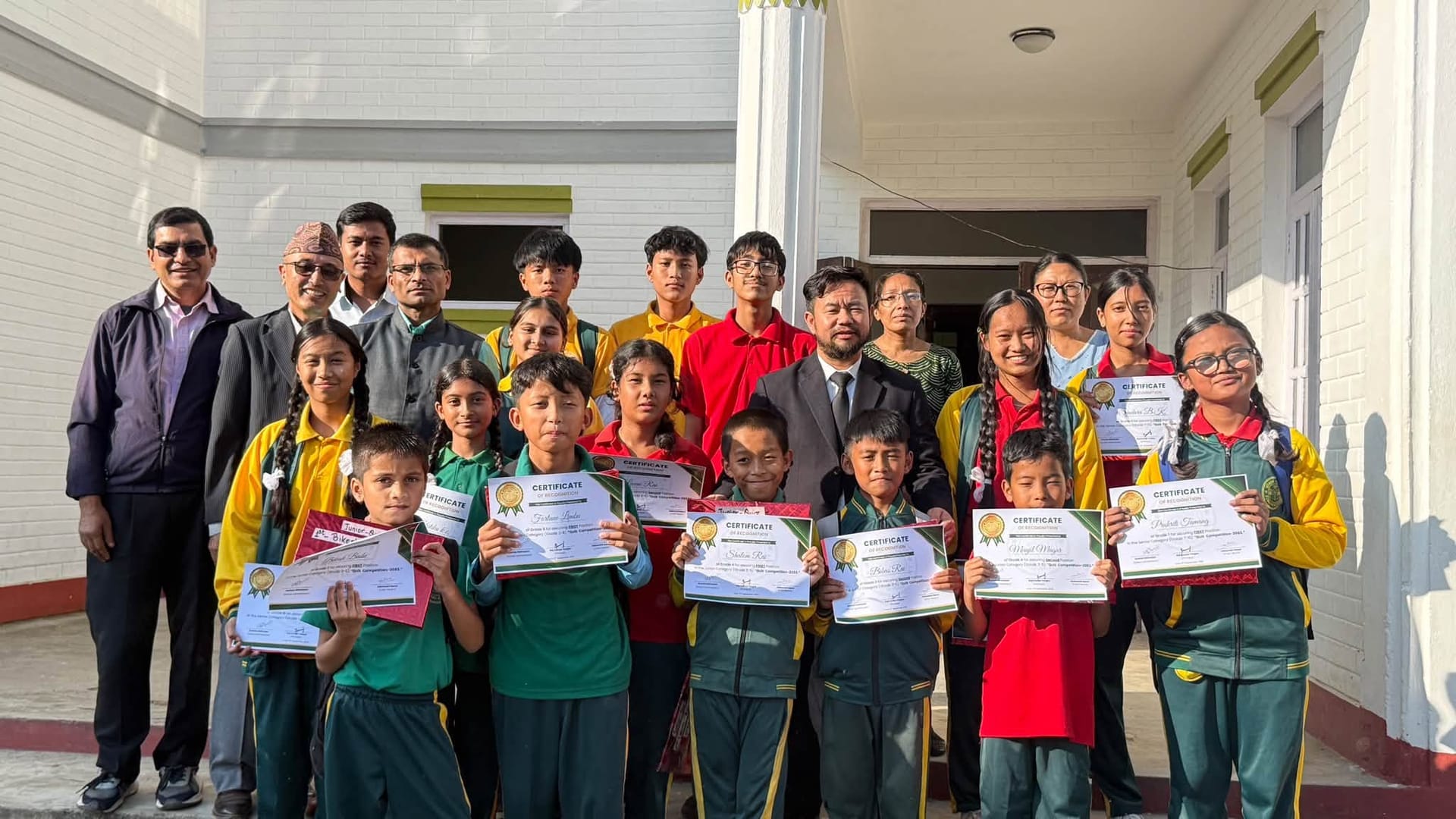 Students and teachers celebrating achievement day at Somang Academy